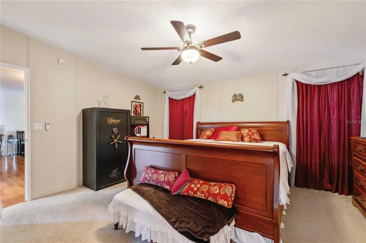 Primary bedroom in this split bedroom plan.
