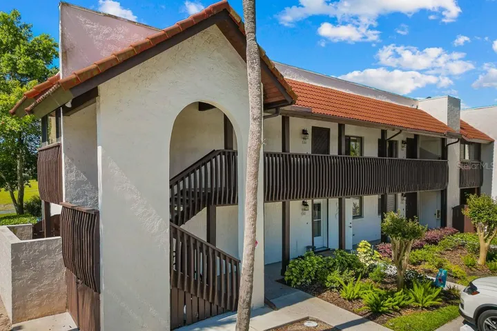 Front with stair to unit