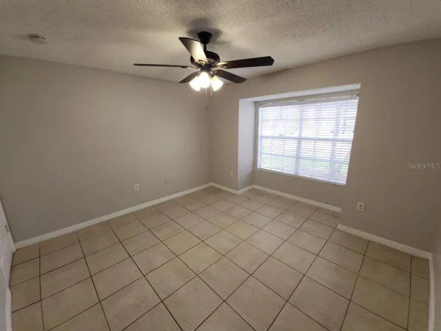 Bedroom w/ Desk Area & Walk-In Closet