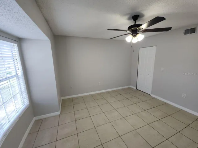 Bedroom w/ Desk Area & Walk-In Closet