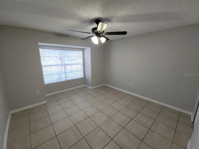 Bedroom w/ Desk Area & Walk-In Closet