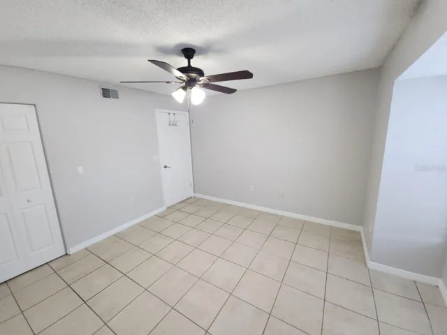 Bedroom w/ Desk Area & Walk-In Closet