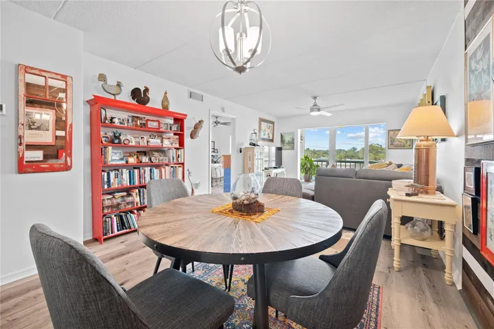 Dining room and living room area with water view