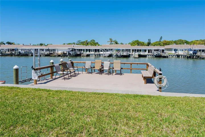Community dock with seating on the water