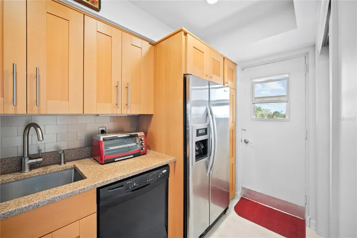 Kitchen with an additional exterior access door