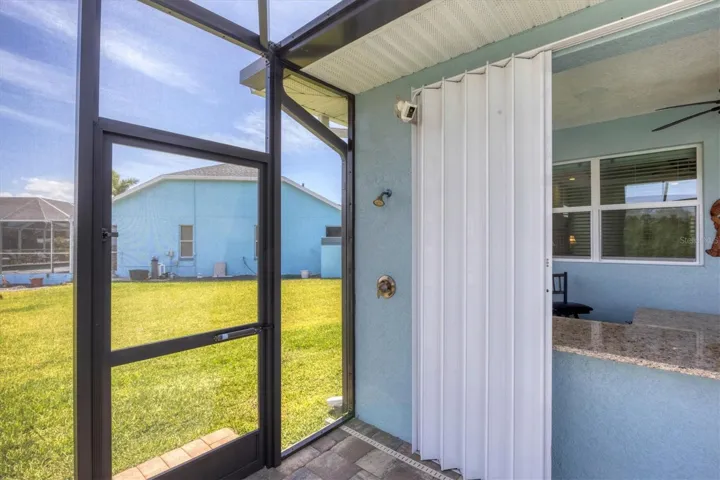 OUTDOOR SHOWER/ACCORDIAN SHUTTERS