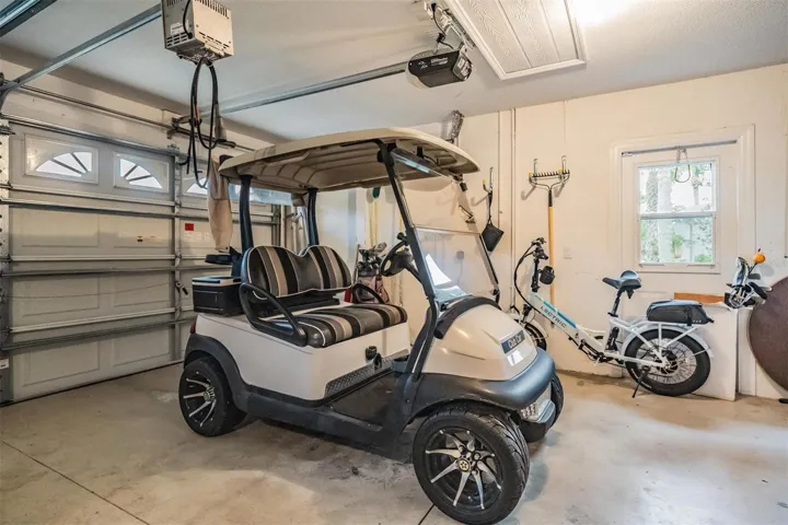 3-car garage. The golf cart comes with the home