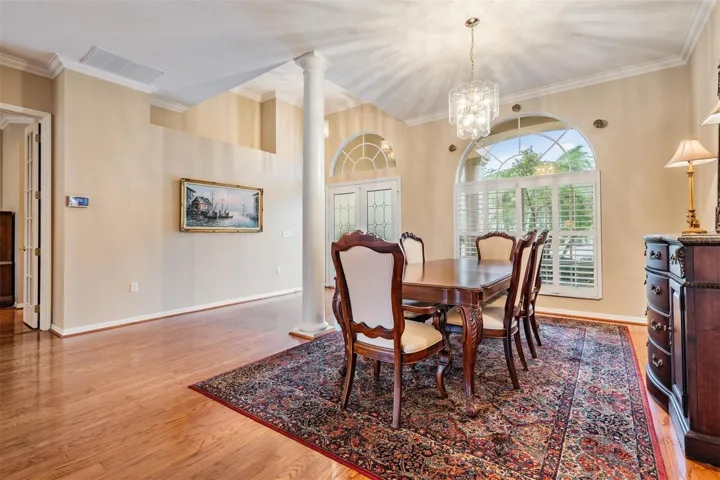 Dining area with an arched window detail