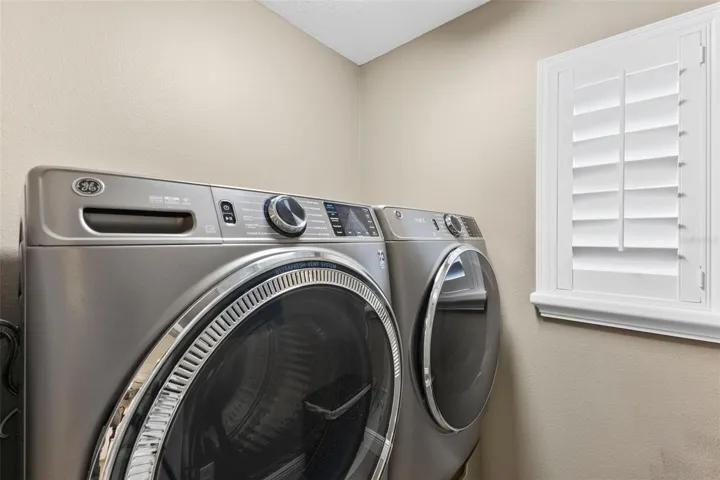 cubby for washer and dryer inside laundry room