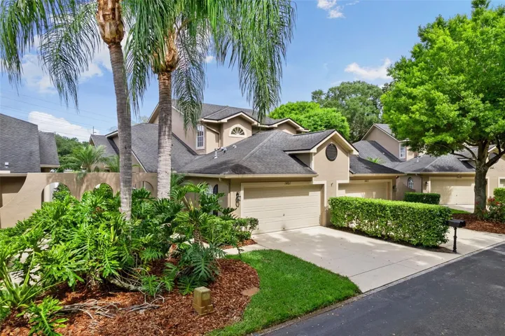 Private street the dead ends. Front of house has a 2 car garage with a courtyard pathway to the front door.