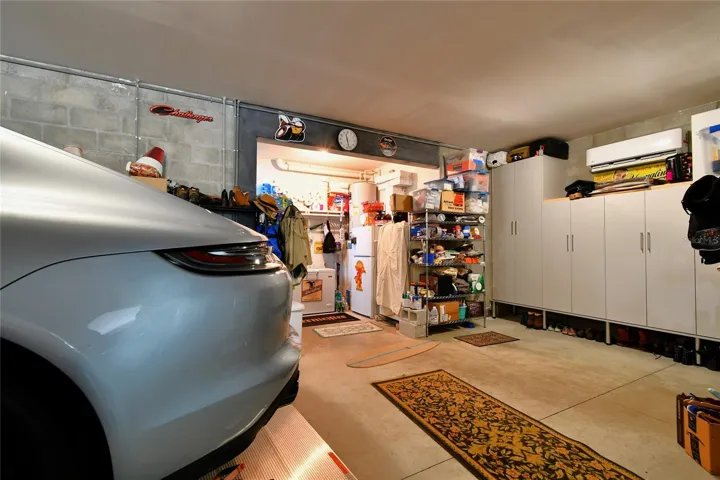 Well designed California closets and fully air conditioned ground floor with two 2-ton split A/C plus insulated garage doors.
