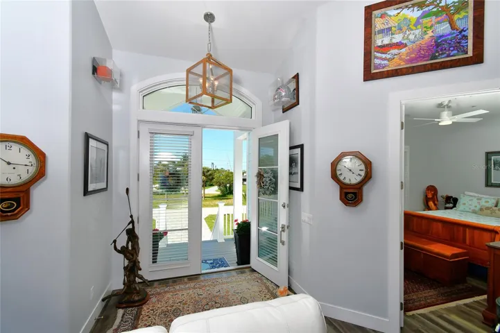 View of front entry and guest bedroom