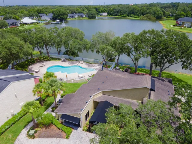 Community Lake Front Clubhouse with Salt Water Pool, Fitness Center, and Billiards Room.