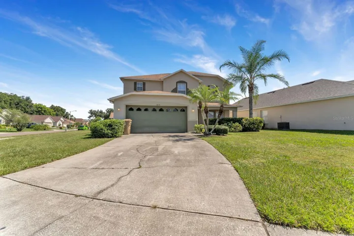 Front of Property with large drive way.