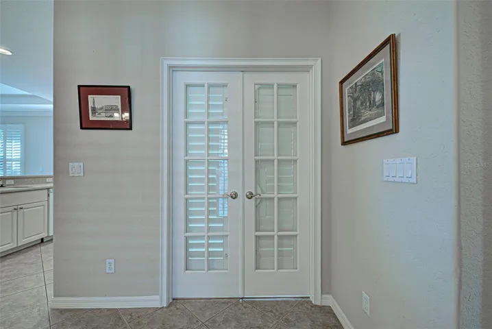 Glass French doorsLeading to office/bedrm