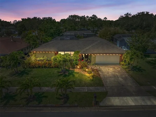 Enjoy the amazing Florida sunsets from your screened lanai and pool