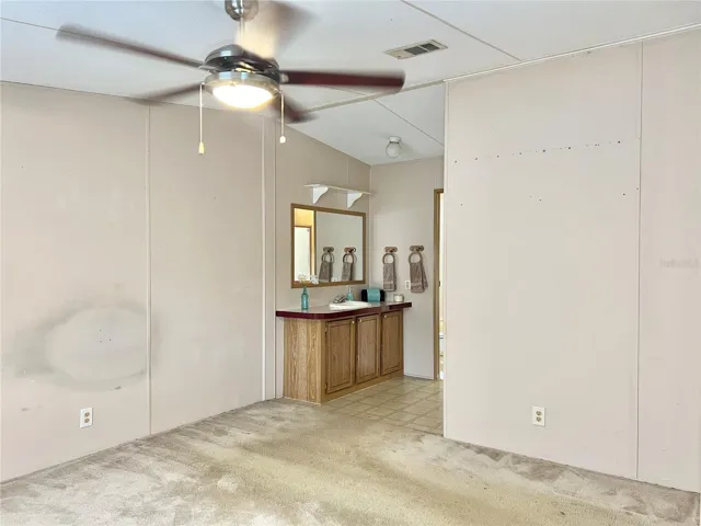 Primary Bedroom - Carpeting and Ceiling Fan