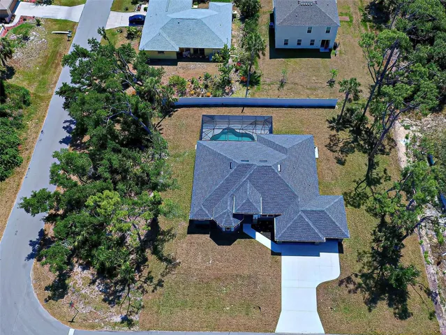 Rare 1/2 acre lot, only minutes from Coco Plum Mall and every convenience you could want.  Bonus: Not in a flood zone, not deed restricted and there is room for your boat, RV and many toys.