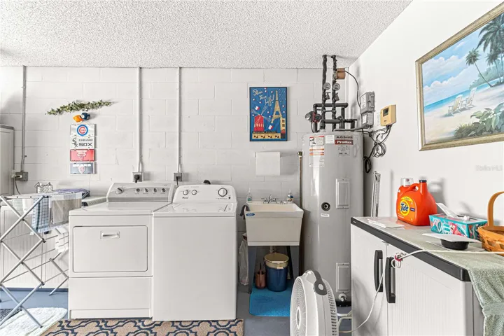 Newer Laundry & Laundry Tub in Garage