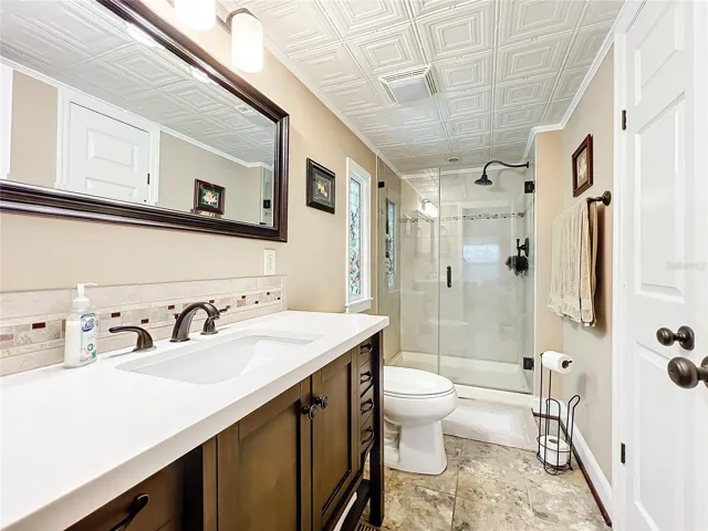 primary bathroom with walk in shower