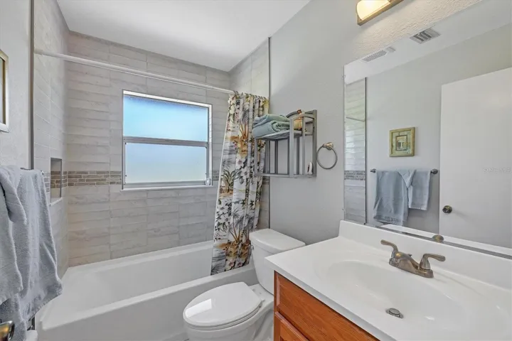 bath 2 beautifully updated, shower walls are just beautiful!