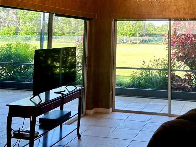 view from sitting room with double set sliding glass doors