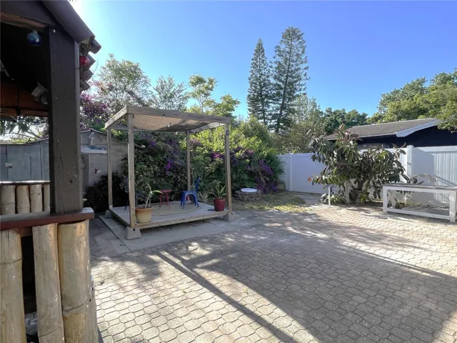 Backyard with pavers, gazebo and storage shed