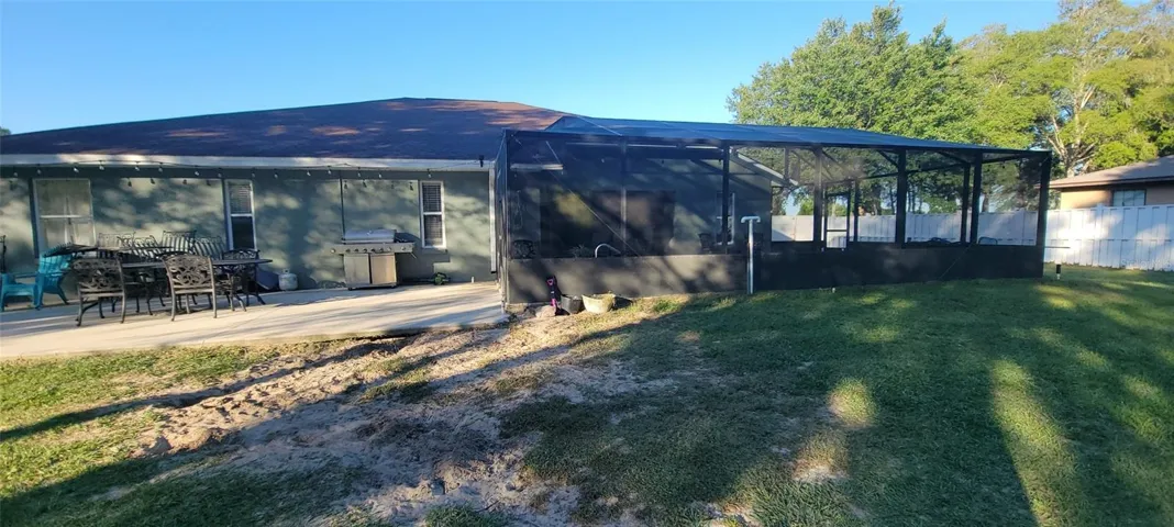 Outdoor patio for BBQ's conveniently located next to lanai and pool