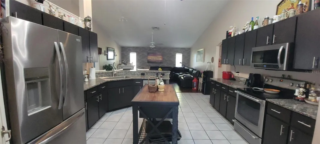 Kitchen showing work space and matching appliances