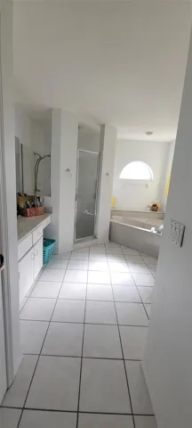 Large master ensuite.  Two sinks, water closet, step in shower and soaking tub.