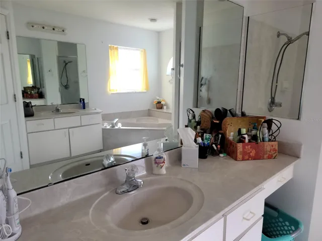 Master bath sink and counter.  Second sink opposite side of room.  Plenty of storage