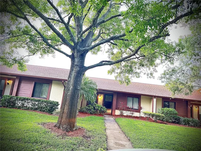 FRONT view walk up.MATURE LANDSCAPE.