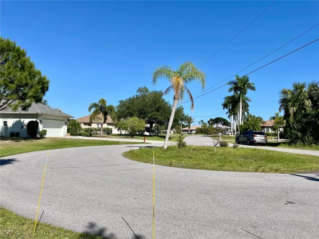 Looking from the lot down the street
