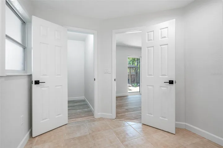 Primary bathroom, walk in closet on left