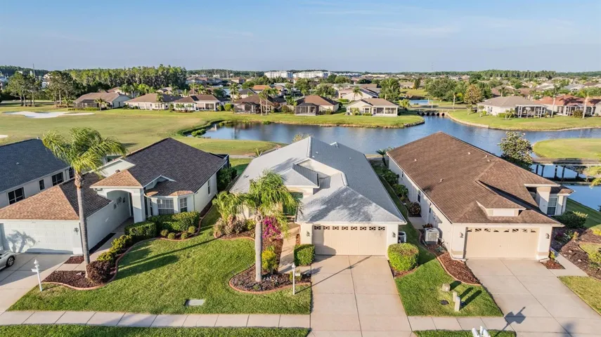 16th hole and pond view neighborhood location from screened-in lanai