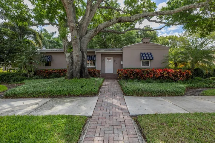 An attractive brick paver entryway welcomes you home