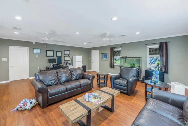 Large Family room (600 sq ft)  with private exterior entrance- could easily be converted to an in-law-suite.