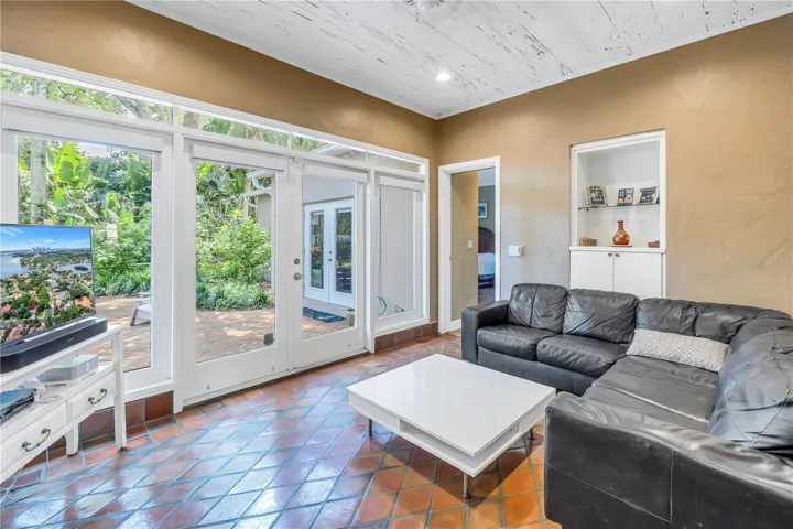 Florida room with Pecky Cypress ceiling