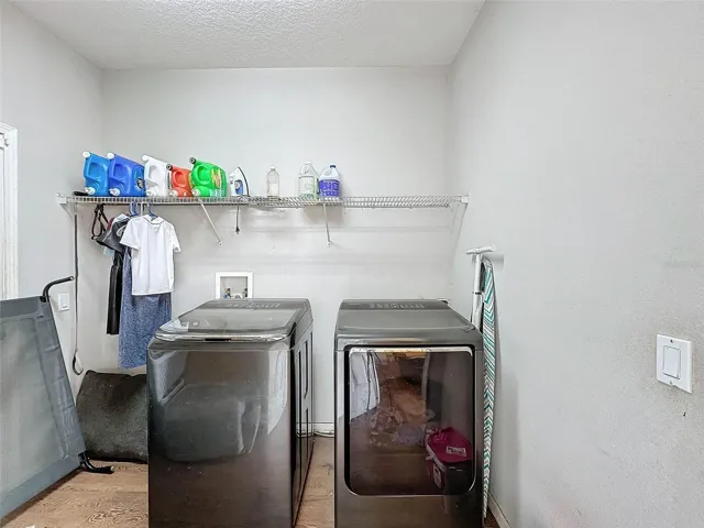 Indoor laundry off the garage.