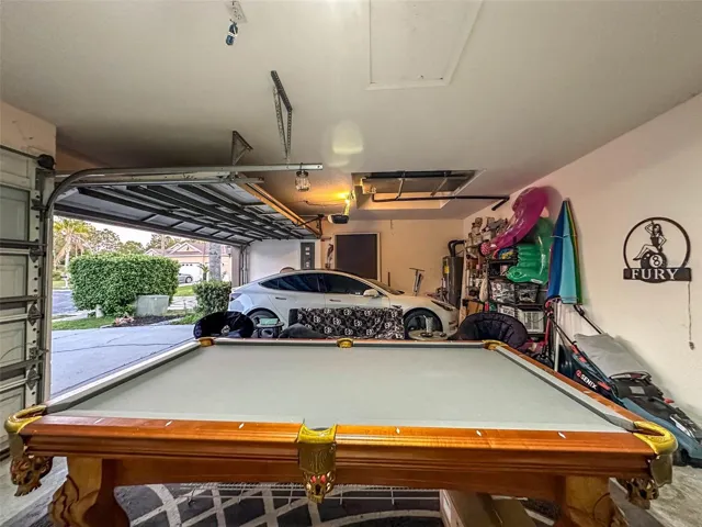 3 car garage or game room on one side.