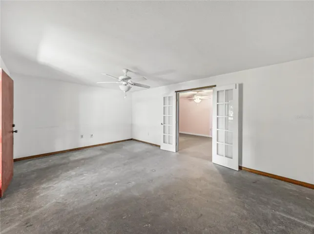 Double door entry to basement bedroom