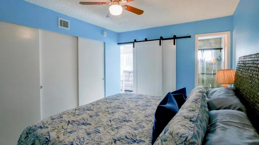 Sliding barn doors create privacy.