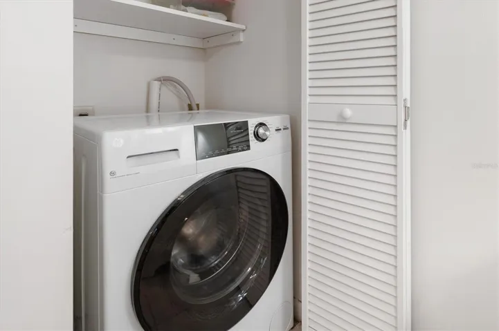 Interior Laundry with All-in-One Washer & Dryer - Owner loves this!