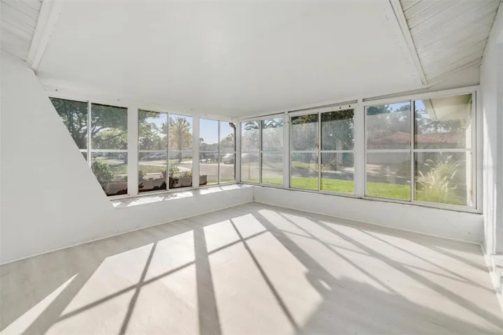 Front enclosed patio with windows