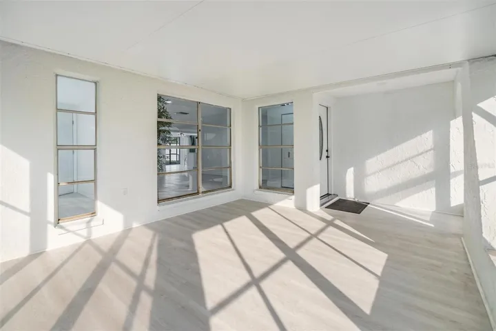 Front enclosed patio with windows