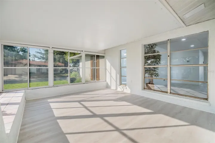 Front enclosed patio with windows