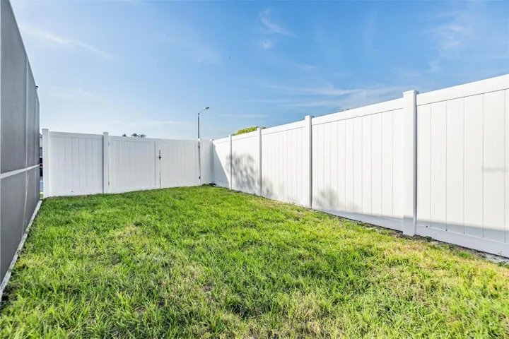 8-feet privacy fence with gate.  2nd drive way on the other side.