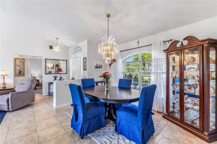 Spacious Dining Area towards Foyer separated by built-in planter.