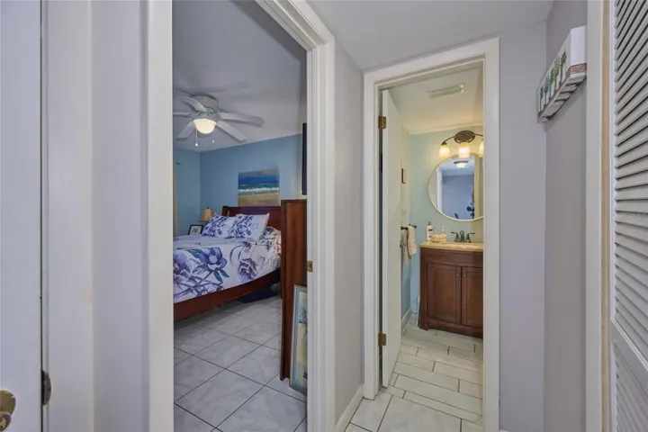 Guest bedroom in relation to full guest bathroom.