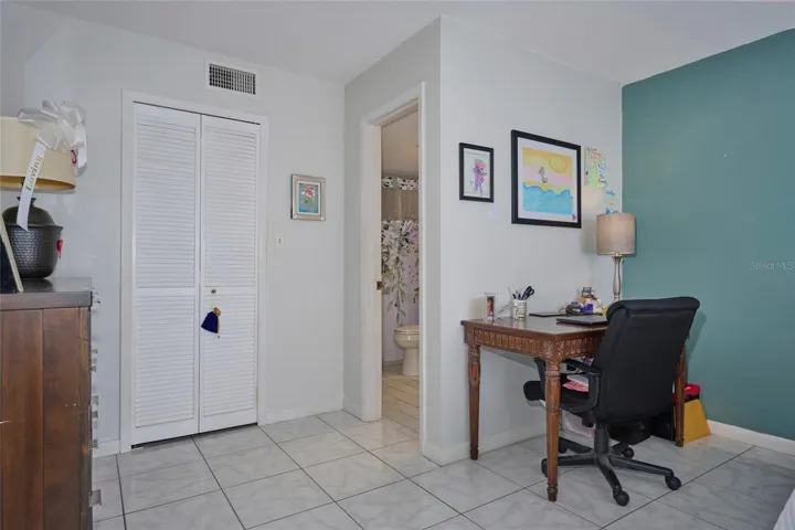 View of door to closet and entry into master ensuite